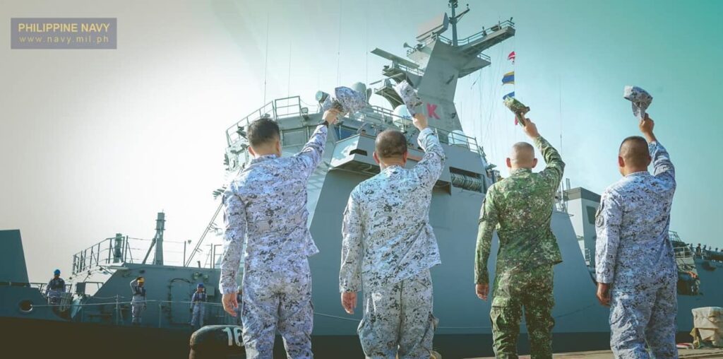 The Fleet Marine Ready Force leadership led by the Commander, BGen Edwin Amadar, waves at BRP Antonio Luna (FF151) as they get underway to participate in the ASEAN-India Maritime Exercise (AIME) 2023